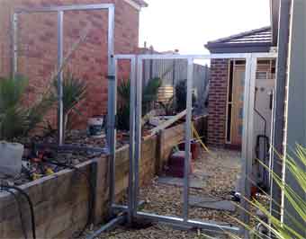 Gate frame with panels 