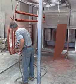 Powder coating a gate 