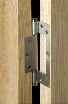 Self closing hinge on timber