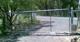 farm gate with a solar gate motor 