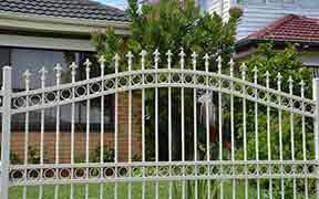 queen spears on a gate