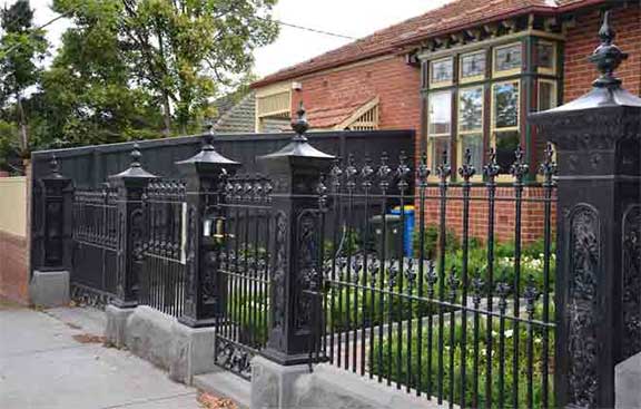 lion post in a fence 