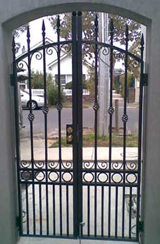 single gate arched at the top wrought iron 
