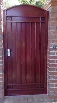deep red gate we built with a gate lock