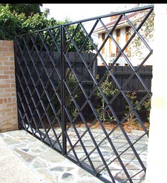 criss cross steel pattern in a set of driveway gates